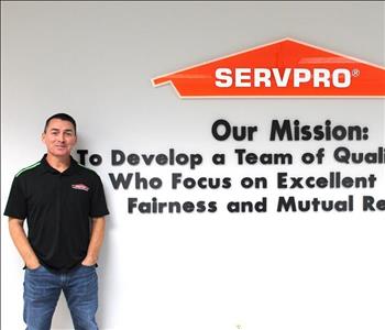 man in front of mission statement