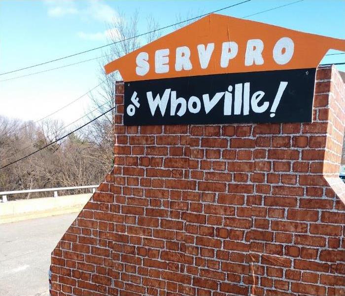 SERVPRO of Whoville sign on makeshift fireplace with blue sky.