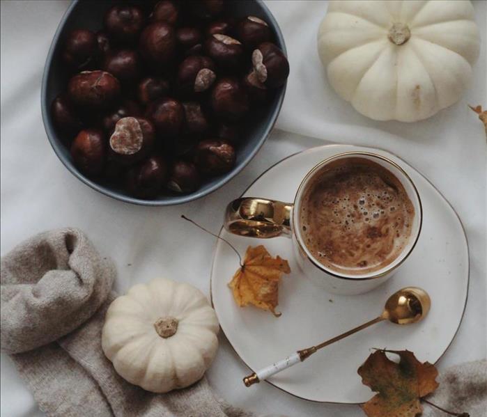 Bird's eye view of a table with chestnuts and hot cocoa on it